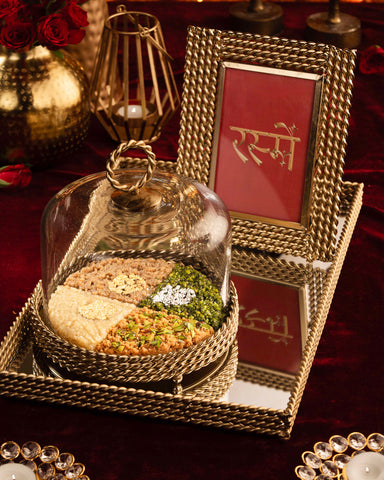 Golden glass assorted mithai cake dome
